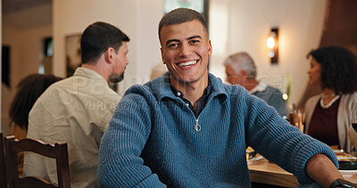 Buy stock photo Thanksgiving, portrait and happy with man in dining room for holiday season, dinner or tradition. Festive feast, party and event with people eating in home for food, hosting and hospitality together