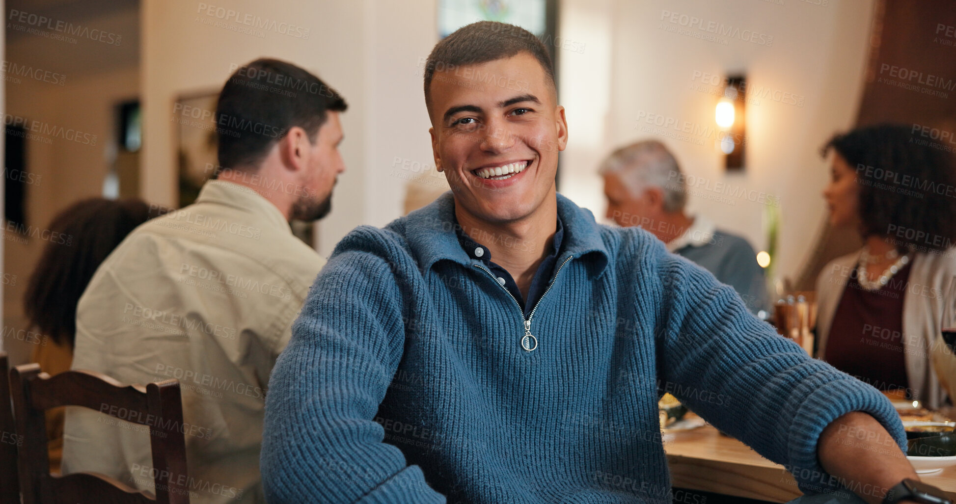 Buy stock photo Thanksgiving, portrait and happy with man in dining room for holiday season, dinner or tradition. Festive feast, party and event with people eating in home for food, hosting and hospitality together