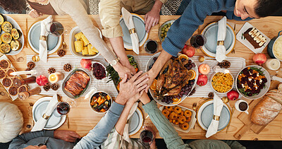 Buy stock photo Above, hands stack and people with food, celebration and bonding together with Christmas, wine or party. Home, family and group with healthy meal, love or Xmas tradition with feast and festive season