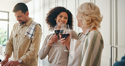 Buy stock photo Women, family and cheers with alcohol for cooking, reunion celebration and bonding together. Happy, senior mother and people toast with red wine, meal preparation and thanksgiving gathering at house