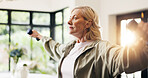 Senior woman, exercise and dumbbells in home with weightlifting, strength training and routine. Elderly person, fitness and strong with muscle development, workout and flare in retirement at house