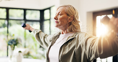 Buy stock photo Senior woman, exercise and dumbbells in home with weightlifting, strength training and routine. Elderly person, fitness and strong with muscle development, workout and flare in retirement at house