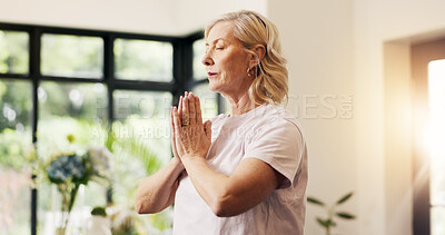 Buy stock photo Woman, prayer hands or yoga in home with breathwork for meditation, spiritual healing or wellness. Zen, mature female person or breathe in house with mudra for mindfulness, holistic health or namaste