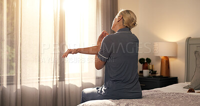 Buy stock photo Back, stretching and woman in bedroom, morning and wellness with lens flare, relax and calm. Home, pensioner and mature person on bed, flexibility and start day with peace, wake up and muscle relief