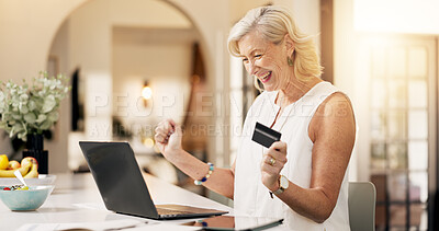 Buy stock photo Mature, happy woman and laptop with credit card in home for online shopping or remote banking app. Female person, shopper or virtual payment with debit on tech for ecommerce or purchase success