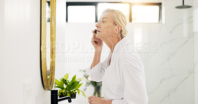Buy stock photo Senior woman, gua sha and skincare in bathroom, mirror and tools for circulation with beauty in house. Mature person, anti aging and process for blood flow, massage and dermatology in retirement home