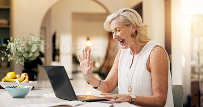 Buy stock photo Woman, laptop and remote work from home, video call or wave for investment broker in kitchen. Mature person, financial advisor and agent for virtual meeting, hello or smile with networking at house