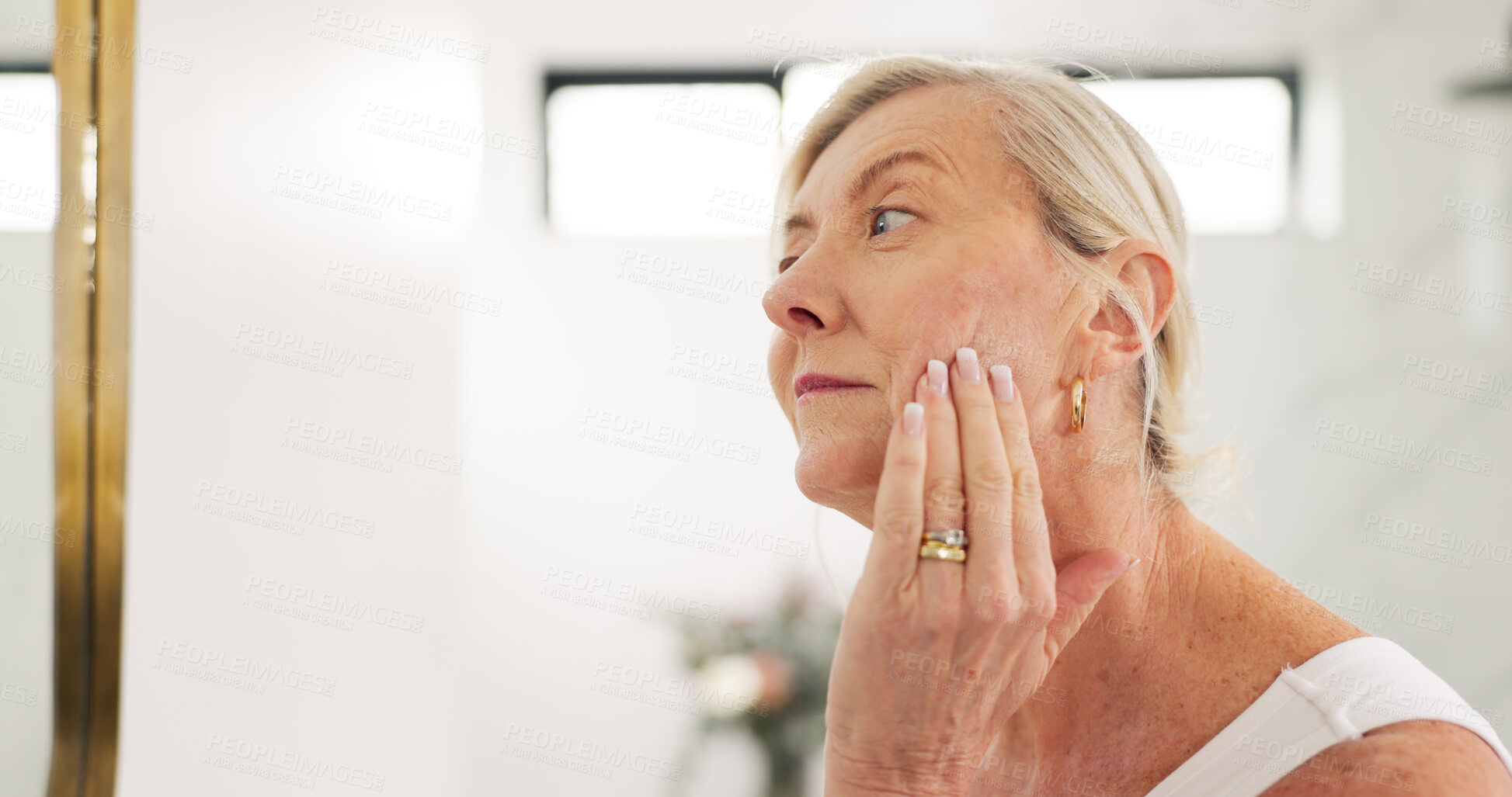 Buy stock photo Woman, check face and skincare in mirror for inspection, dry skin and facial texture in bathroom. Mature person, beauty and cosmetics for acne scars, fine lines and wrinkles for anti aging at house