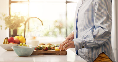 Buy stock photo Hands, fruit salad and cutting board in kitchen, recipe and meal prep with organic ingredients at home. Person, knife and flare with nutrition, diet or self care for wellness in retirement at house
