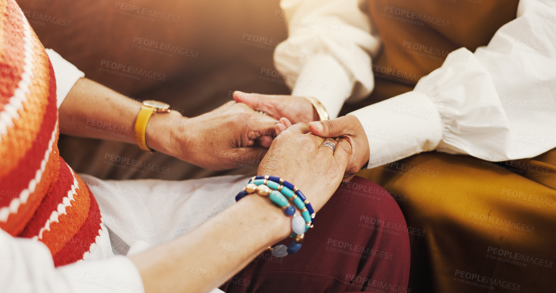 Buy stock photo Holding hands, support and women friends on sofa with comfort, love and bonding together. Trust, compassion and female people with connection in living room for empathy, care or solidarity in home.