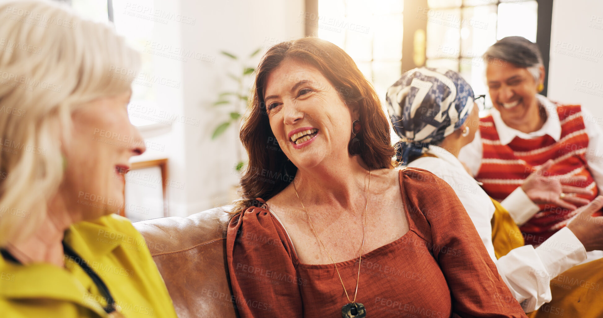 Buy stock photo Old women, laugh and discussion on couch, home and bonding with friends in lounge, happy and gossip. Senior people, conversation and humor for funny joke in living room, flare and break in apartment