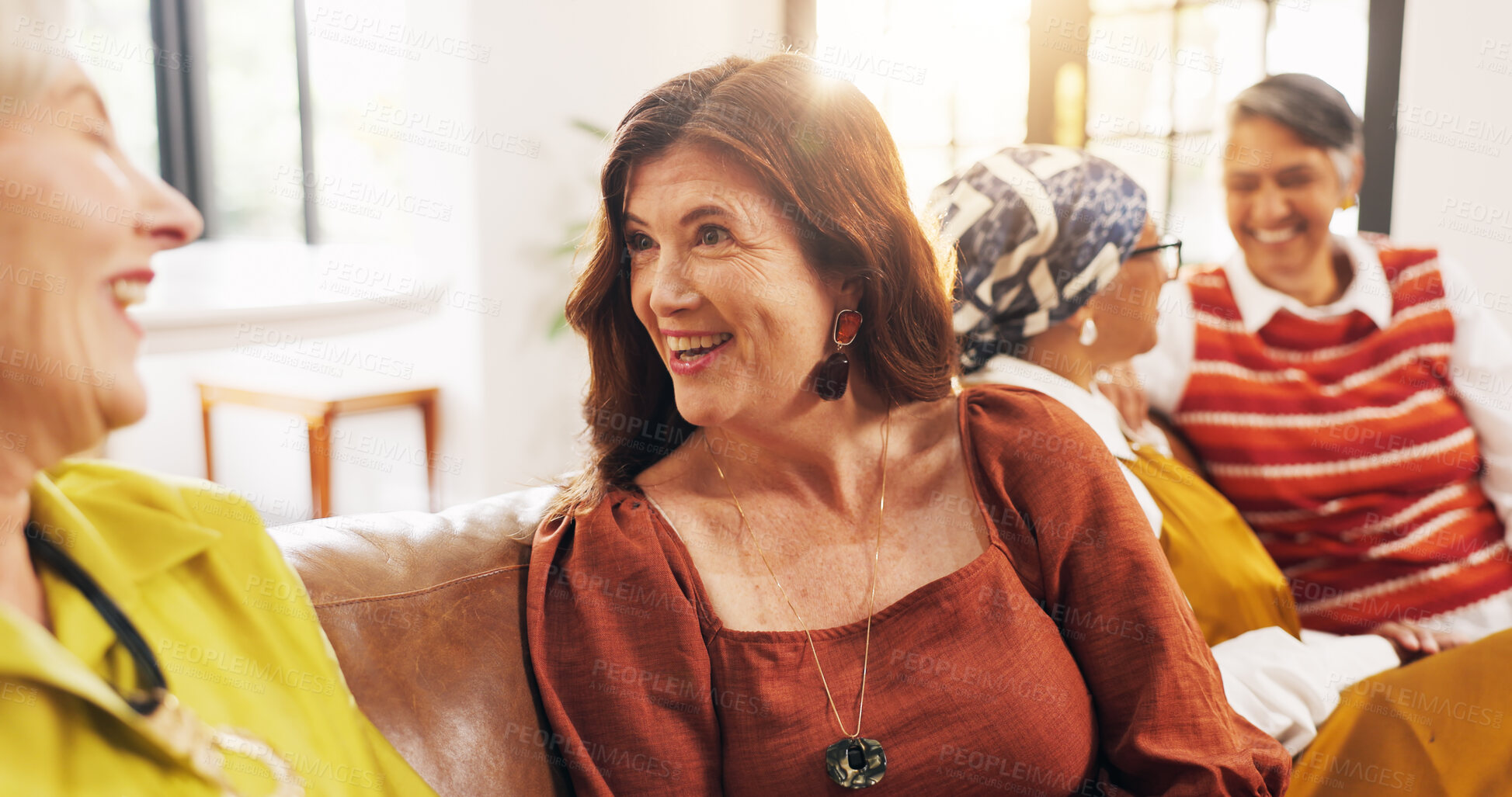 Buy stock photo Happy, friends and old women on couch, home and bonding with gossip in lounge, laughing and reunion. Senior people, conversation and humor for funny joke in living room, flare and break in apartment