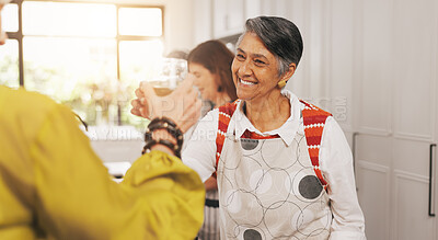 Buy stock photo Senior woman, cheers and alcohol in kitchen for cooking, celebration and bonding together. Smile, elderly person and toast drink with friends of reunion, meal preparation and social gathering in home