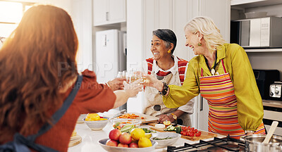 Buy stock photo Cooking, kitchen and mature women with toast for bonding, conversation or culinary lesson. Happy, social reunion and senior friends with cheers, alcohol and food for learning recipes together in home