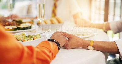 Buy stock photo People, holding hands and prayer with food on dining table for gratitude, appreciation and faith. Group, friends or social gathering with trust, meal or hope for culture, feast or tradition in home