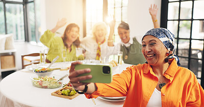 Buy stock photo Mature, happy women and dining table with selfie fo meal, social gathering or feast in home. Group, female person or friends with smile, food or drinks for photography, picture or memory together