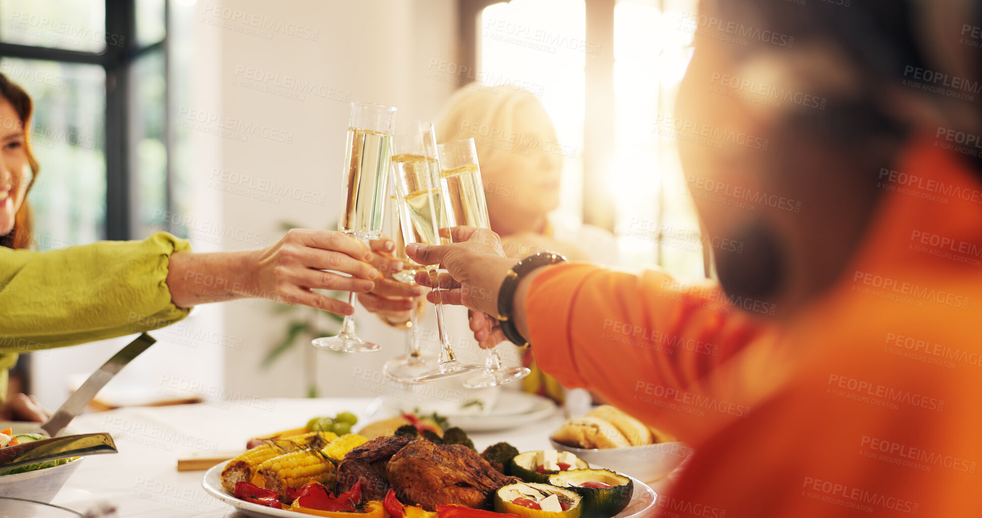 Buy stock photo Women, hands and glasses with cheers, food or meal for celebration or gathering together in home. People, toast or group of friends with champagne, dinner or feast for reunion or party in house