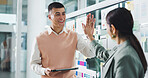 People, high five and team for app development at startup, motivation or tablet for celebration. Woman, man and achievement with goals, success and glass wall with ux design job at digital agency