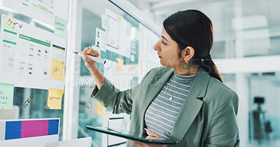 Buy stock photo Writing, creative and business woman in office for mobile app software, website and ui design. Digital agency, tablet and person with paperwork, ideas and layout for research, planning and project