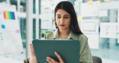 Buy stock photo Business, woman and tablet with reading in office for software development, UX design or app testing. Web designer, employee and digital tech for user research, site performance and creative planning