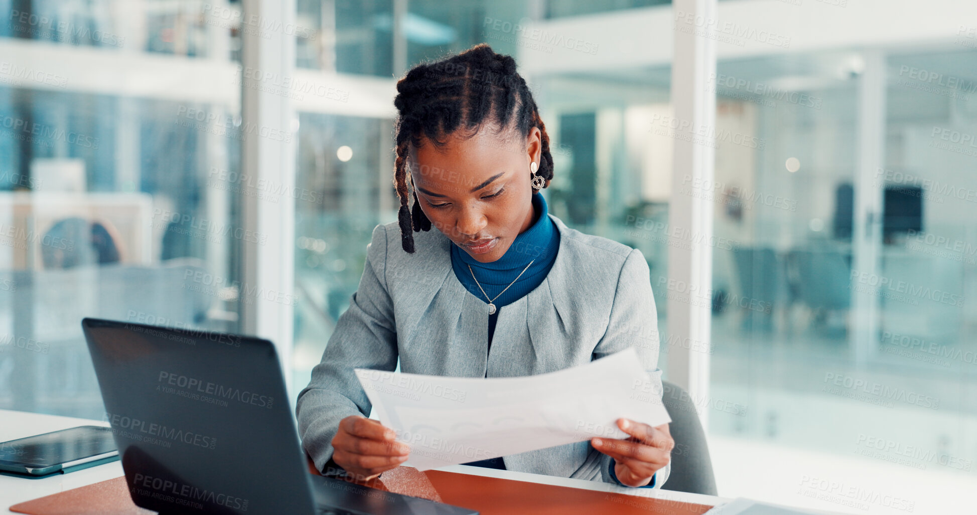 Buy stock photo Laptop, business woman and paperwork in office for investment report, stocks analysis and IPS. Portfolio manager, black person and tech with documents at desk for economic data and performance review