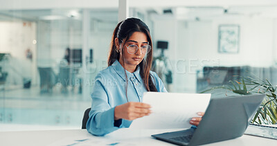 Buy stock photo Laptop, businesswoman and paperwork review in office for stocks analysis, financial report and IPS. Portfolio manager, person and tech with documents at desk for tax strategy and tracking performance