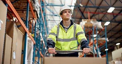 Buy stock photo Logistics, low angle or man in warehouse with trolley, shipment prep or inventory management in delivery. Distribution, ppe or loader in depot with box, dropshipping or export control in supply chain