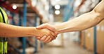 Business people, logistics or handshake with deal in warehouse for partnership, b2b or supply chain. Closeup, distributor or supplier shaking hands in aisle for shipping, distribution or wholesale