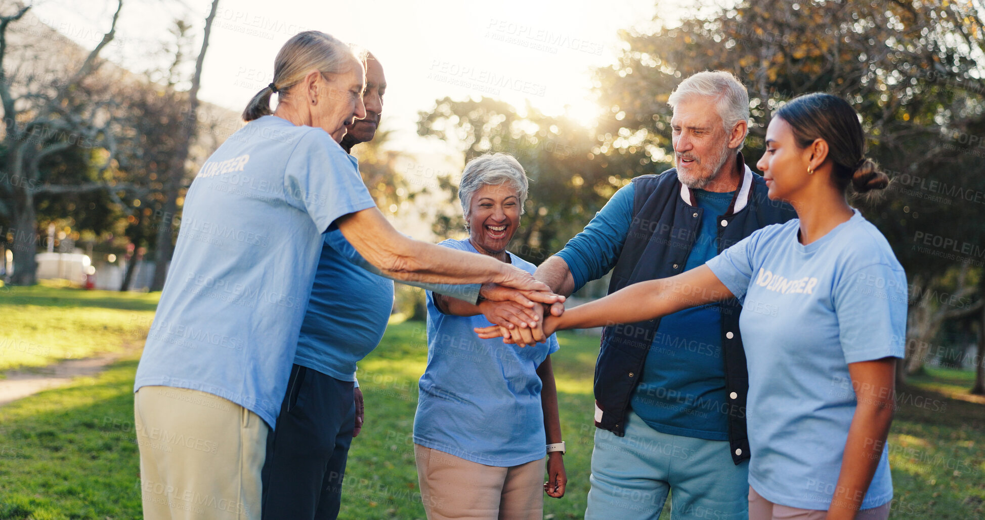 Buy stock photo People, volunteer and stack hands at park, motivation and celebration with social responsibility. Women, men and excited with senior team, support or goals with success at charity event in summer