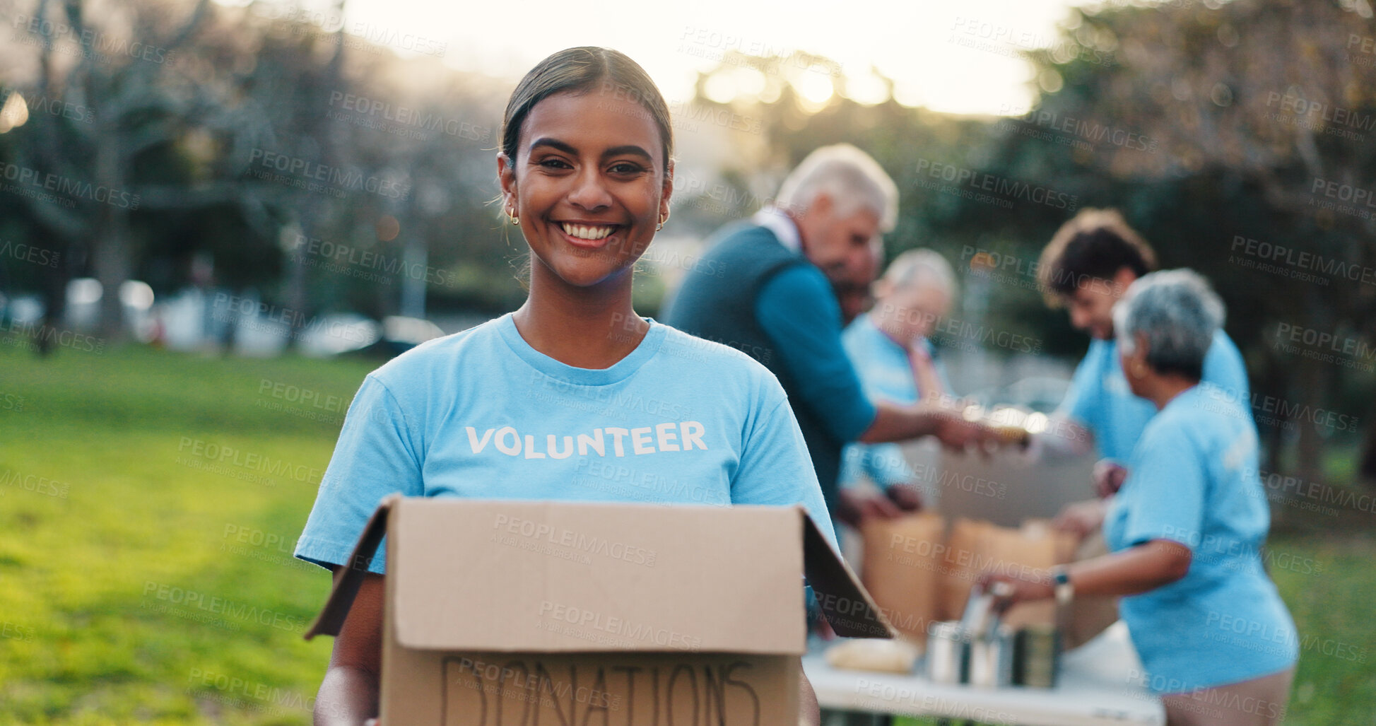 Buy stock photo Volunteer, outdoor and portrait of woman with box for food drive, charity event and donation. Help, teamwork and people with package for outreach program, community service and nonprofit in park