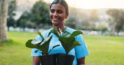 Buy stock photo Volunteer, happy and woman with plants in park for climate change, sustainable project and community service. Outdoor, nonprofit and person with nature for environment, earth day and conservation