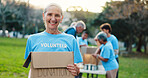 Volunteer, park and portrait of mature woman with box for food drive, charity event and donation. Help, teamwork and people with package for outreach program, community service and nonprofit outdoor