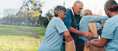 Buy stock photo Volunteer, outdoor and senior people with packages for food drive, charity event and donation. Helping, teamwork and group with bags for outreach program, community service and nonprofit in park