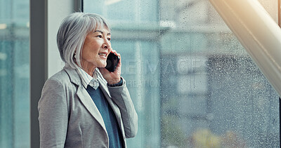 Buy stock photo Business, phone call and woman in office, window and financial advisor with connection. View, mature employee or Japanese person with cellphone, contact and schedule for trading portfolio and talking