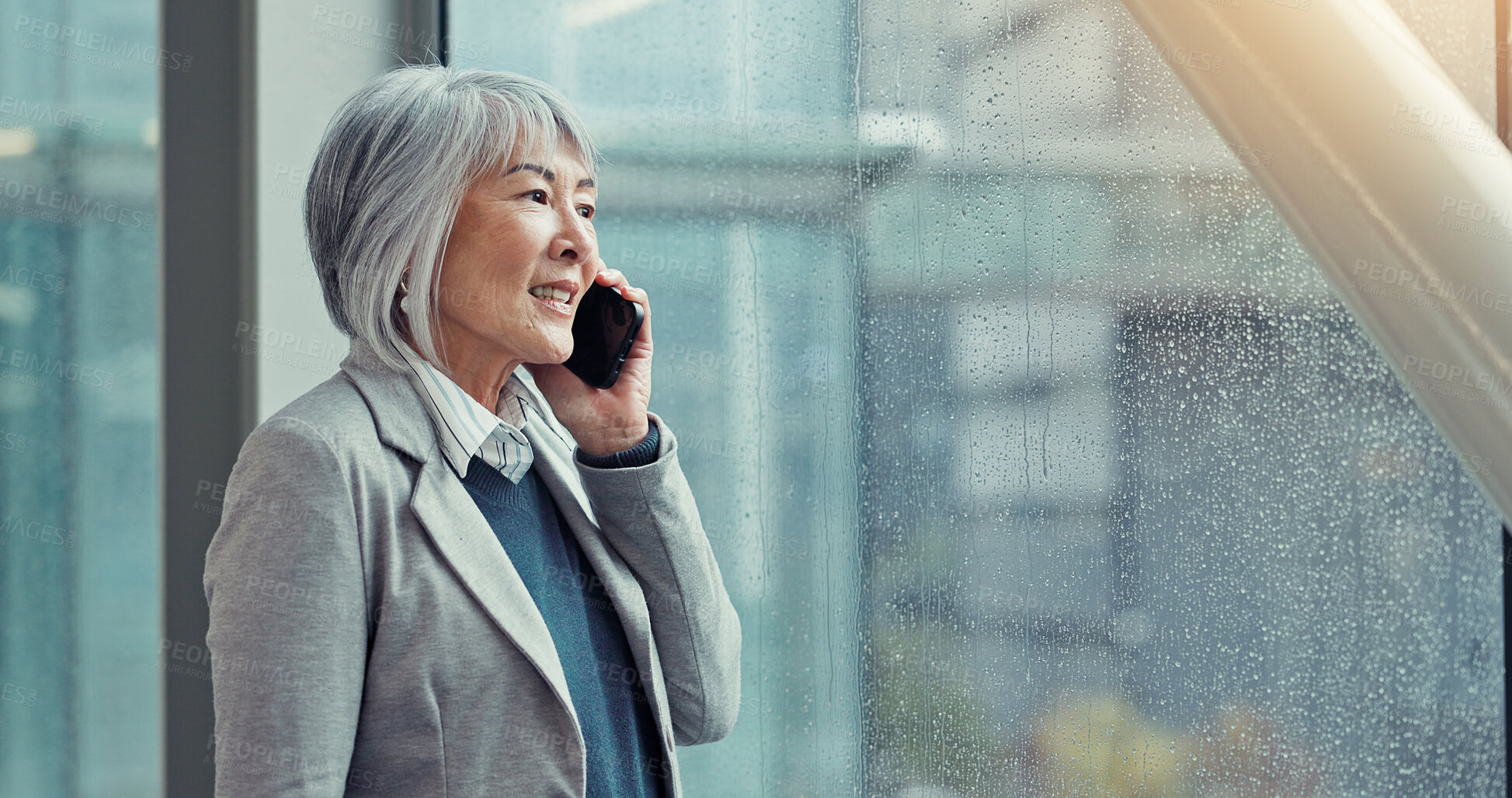 Buy stock photo Business, phone call and woman in office, window and financial advisor with connection. View, mature employee or Japanese person with cellphone, contact and schedule for trading portfolio and talking