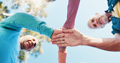 Buy stock photo Senior people, hands and stack for fitness, solidarity or teamwork support in outdoor park. Collaboration, happy group and friends together for motivation goals, mission or workout exercise below