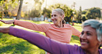 Yoga, stretching and smile with old people in park for wellness, workout or mobility exercise. Joint friendly training, retirement and learning with senior women outdoor for health and fitness