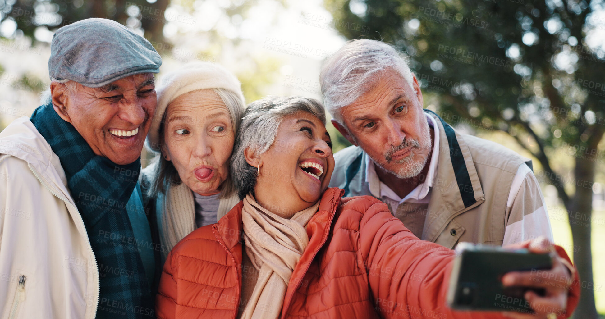 Buy stock photo Senior friends, selfie and funny face at park for happy memory, tongue out or group laugh together. Profile picture, elderly men and women outdoor for silly photo, social media update and retirement