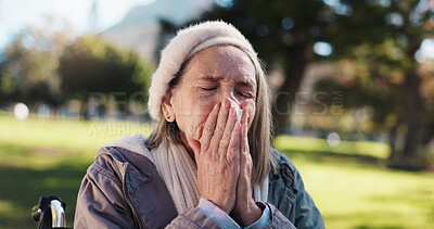 Buy stock photo Old woman, tissue and blowing nose in park with flu for sickness, hayfever and sinus infection. Elderly person outdoor, allergies and health problem with toilet paper, congestion and virus symptoms.