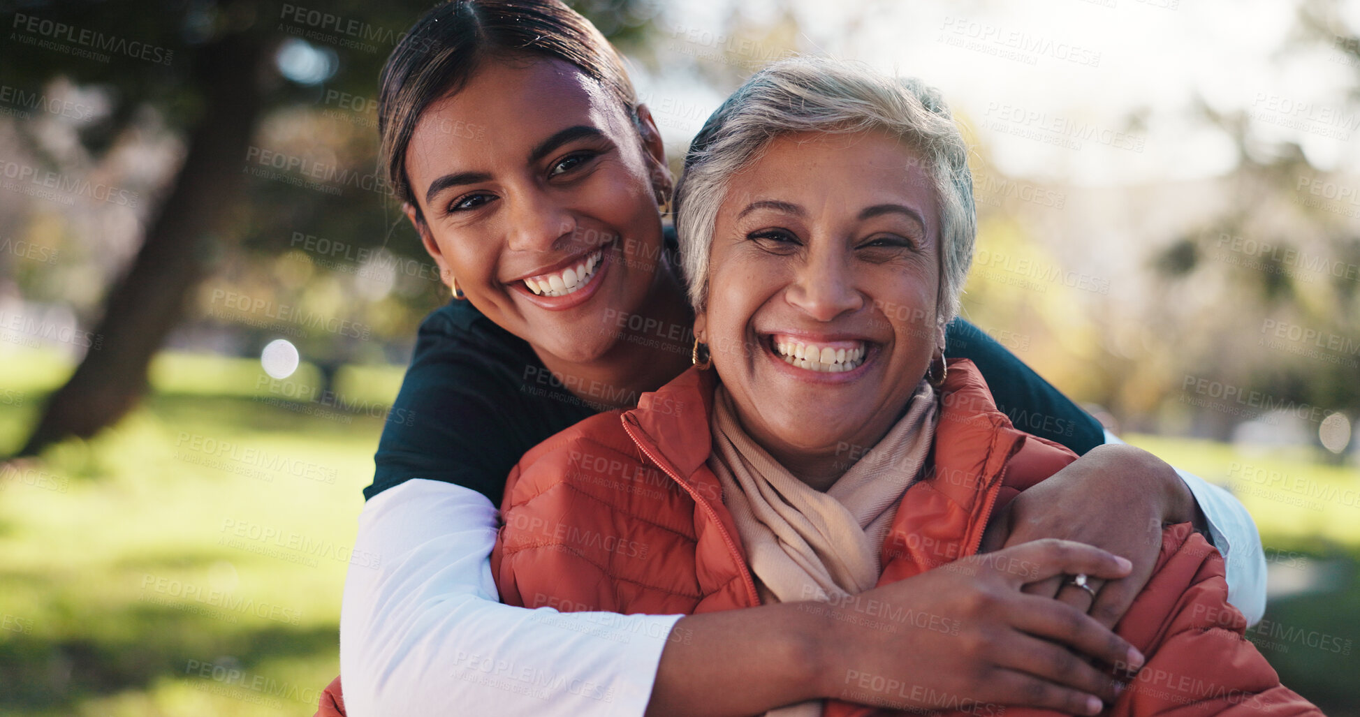 Buy stock photo Hug, portrait and smile of caregiver with old woman in park for assisted living or rehabilitation. Love, support or wellness with happy nurse and senior patient embracing in nature for retirement