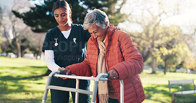 Buy stock photo Outdoor, caregiver and old woman with walker, support and laughing on walk, rehabilitation and trust. Park, nurse and physical therapy for elderly patient with disability, happy and senior care