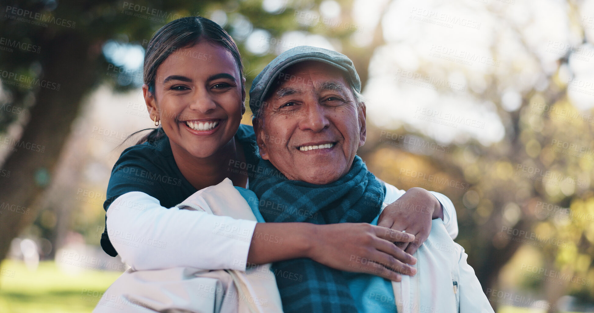 Buy stock photo Hug, love and portrait of nurse with old man in park for assisted living or rehabilitation. Retirement, smile or wellness with happy caregiver and senior patient embracing in nature for support
