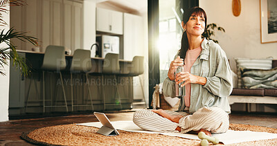 Buy stock photo Thinking, water bottle and yoga with woman on floor in living room of home for online holistic course. Drink, tablet and vision with mature yogi person in apartment for virtual health tutorial