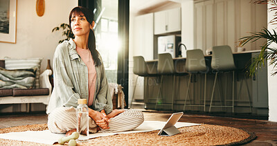 Buy stock photo Fitness, tablet and thinking with woman on floor in living room of home for online holistic course. App, vision and yoga with mature person in apartment for virtual health class or wellness tutorial