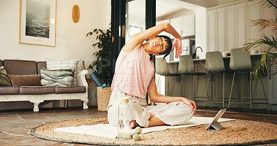 Buy stock photo Woman, fitness or stretching with tablet for online class, exercise tutorial or mindfulness in home. Active, female person or yoga with technology, water or dumbbells for virtual lesson or activity