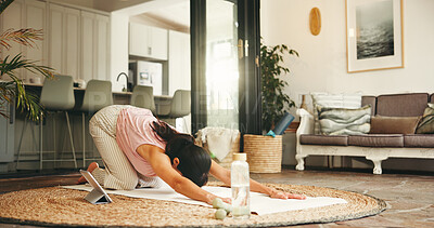 Buy stock photo Woman, stretching and yoga with tablet at house for fitness, online class and balance with core strength. Female person, childs pose and tutorial video for flexibility, inner peace and zen wellness