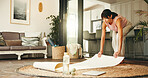 Fitness, getting ready and yoga mat with woman in living room of home for holistic health. Exercise, start and wellness with mature yogi person in apartment for balance, awareness or mindfulness