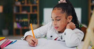 Buy stock photo Home, writing and child with homework, learning and preparing for assignment, education or knowledge. Studying, kid and girl with notebook for project, growth and student with fine motor development