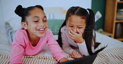 Buy stock photo Relax, laugh and kids on tablet in bedroom for online entertainment, watching cartoons and movie. Family home, siblings and happy girls on tech for streaming videos, bonding and playing games on bed
