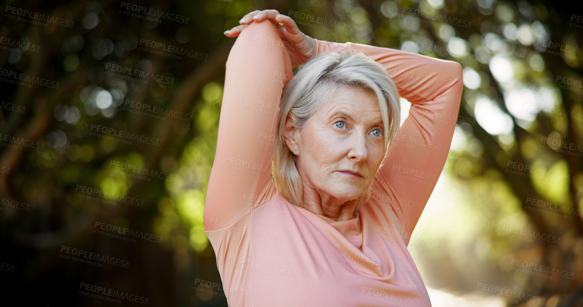 Buy stock photo Outdoor, senior woman and arm stretching for workout preparation, body care and getting ready. Retirement fitness, wellness and mature runner in park with warm up exercise, mobility activity or bokeh